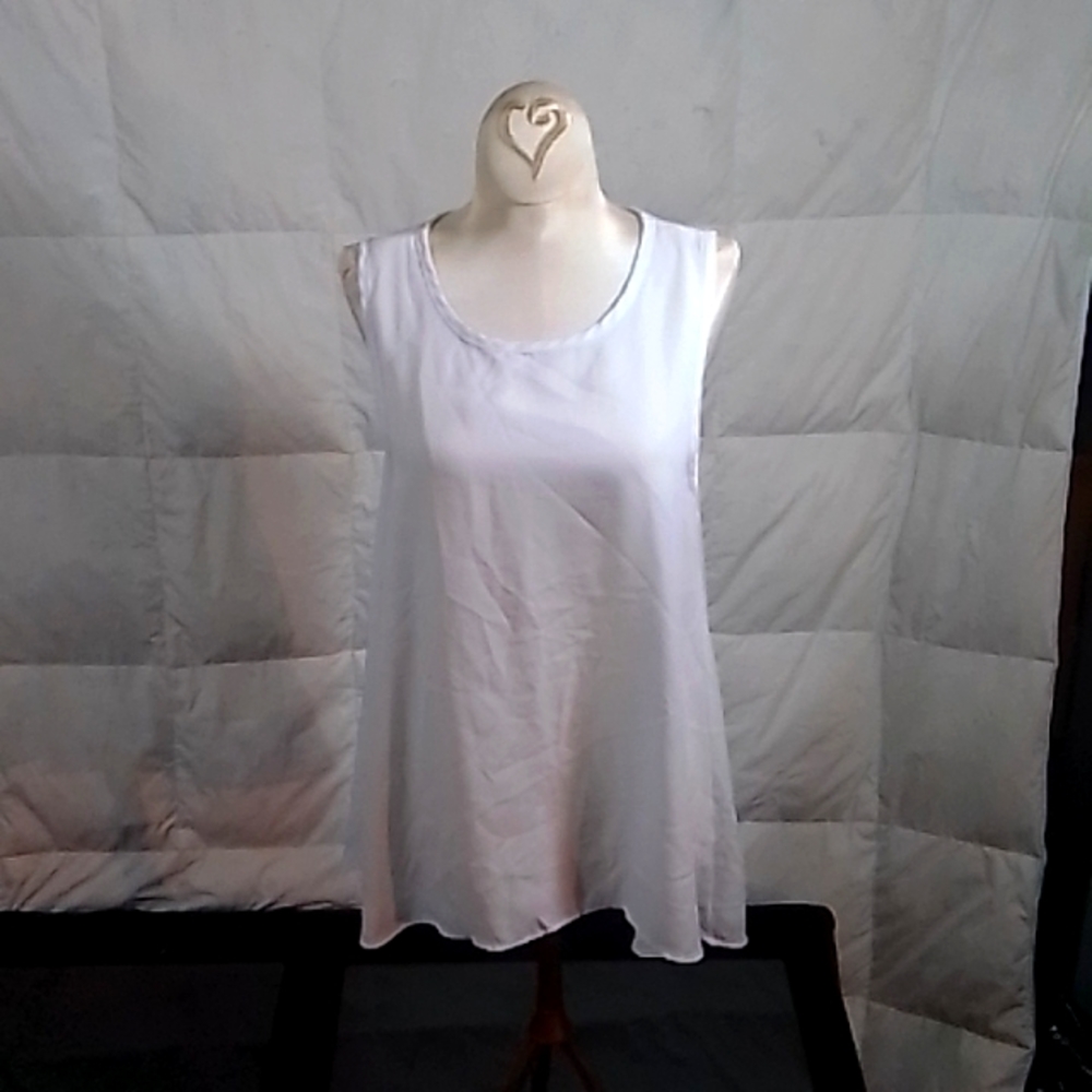 Sleeveless mid cut blouse by Aura